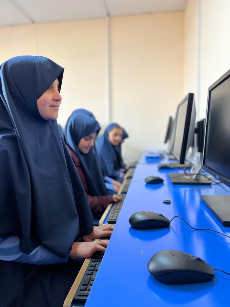 Happy using Computer Afghanistan IISNA World Aid Orphanage